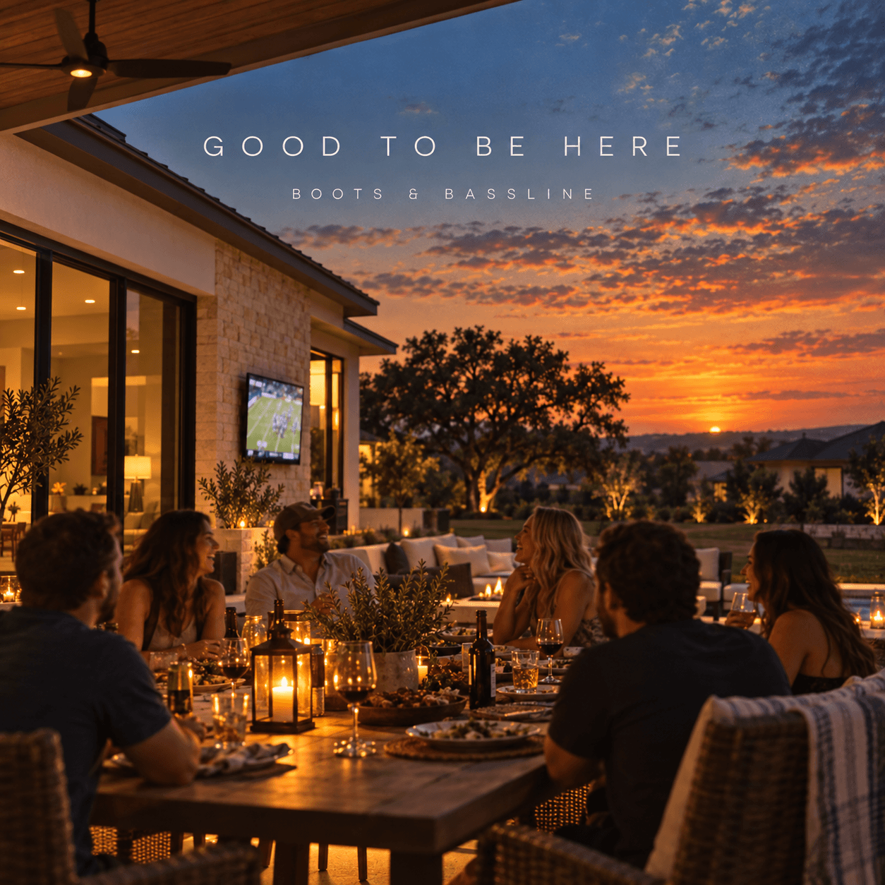 Friends gathered for dinner on a Georgetown patio at dusk, with a game on a television.